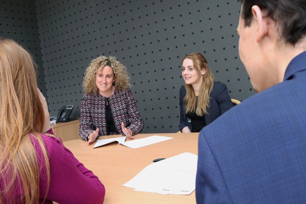 Meeting between solicitors at the Black Norman office