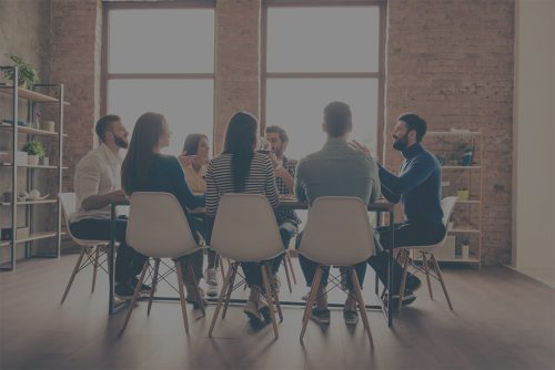 People meeting to discuss Commercial law